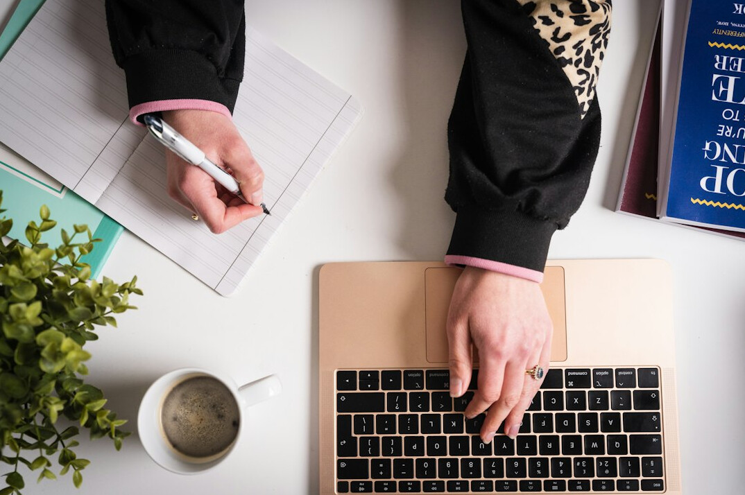 author writing at desk